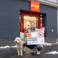 Managing Director Kai Pataky with dog Louis in front of PENNY store