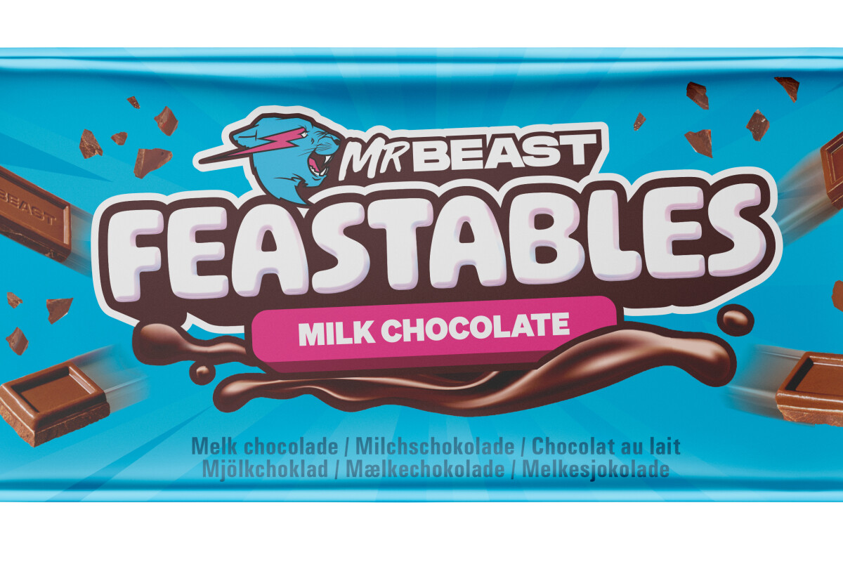 A blue MrBeast Feastables milk chocolate wrapper featuring chunks of chocolate and branding text. The label includes translations for "milk chocolate" in multiple languages.