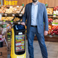 BILLA salesman Marko Miskovic with his new service robot ‘Gloggi’.