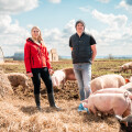 Ja! Natürlich free-range pigs at Josef Schiefer's farm with Ja! Natürlich managing director Klaudia Atzmüller